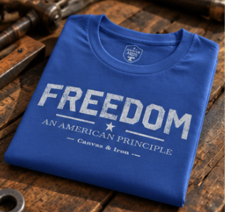 Folded Freedom Essential royal blue T-shirt showing front Freedom and An American Principle graphic