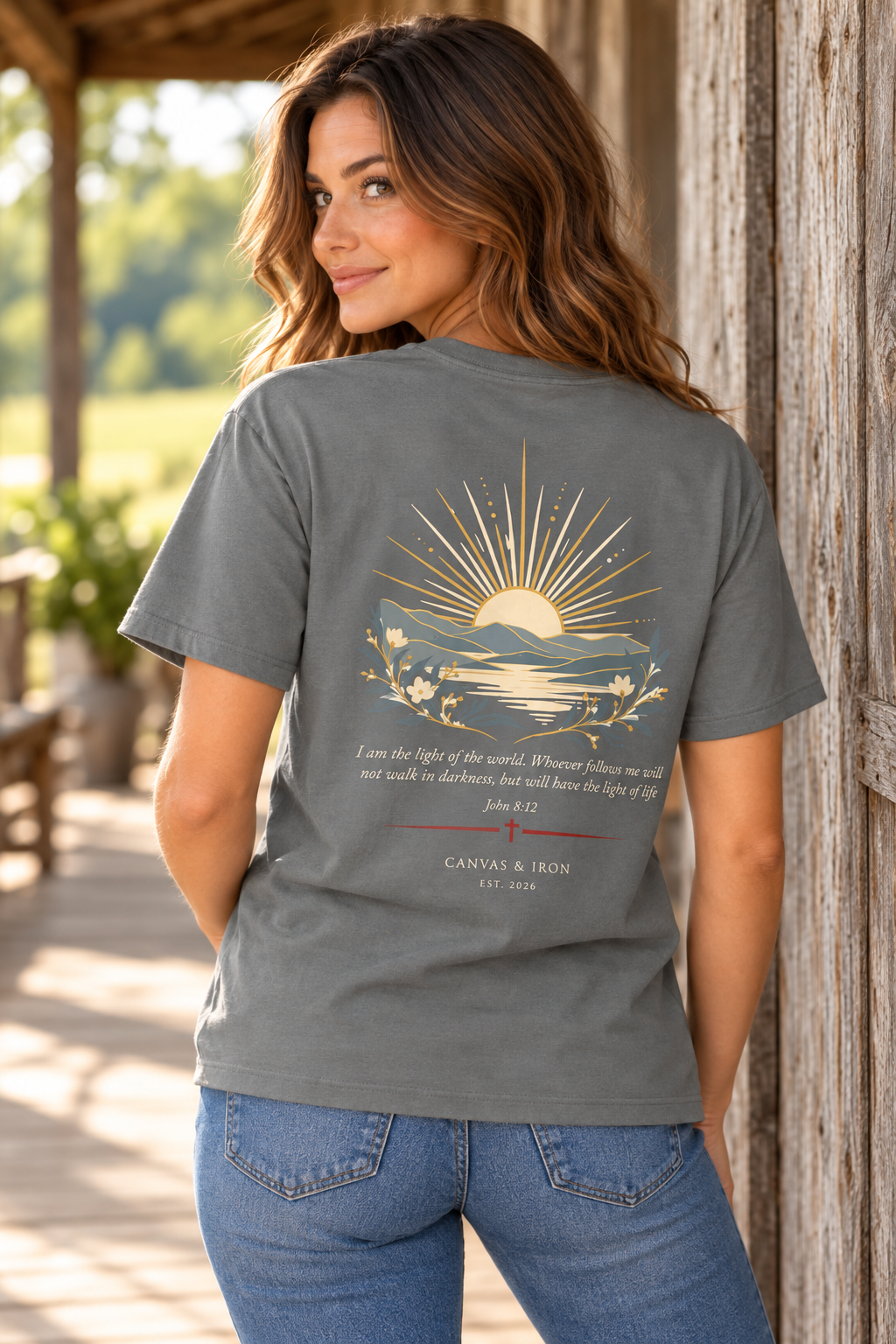 Back of The Light women’s faith tee with John 8:12 sunrise landscape artwork